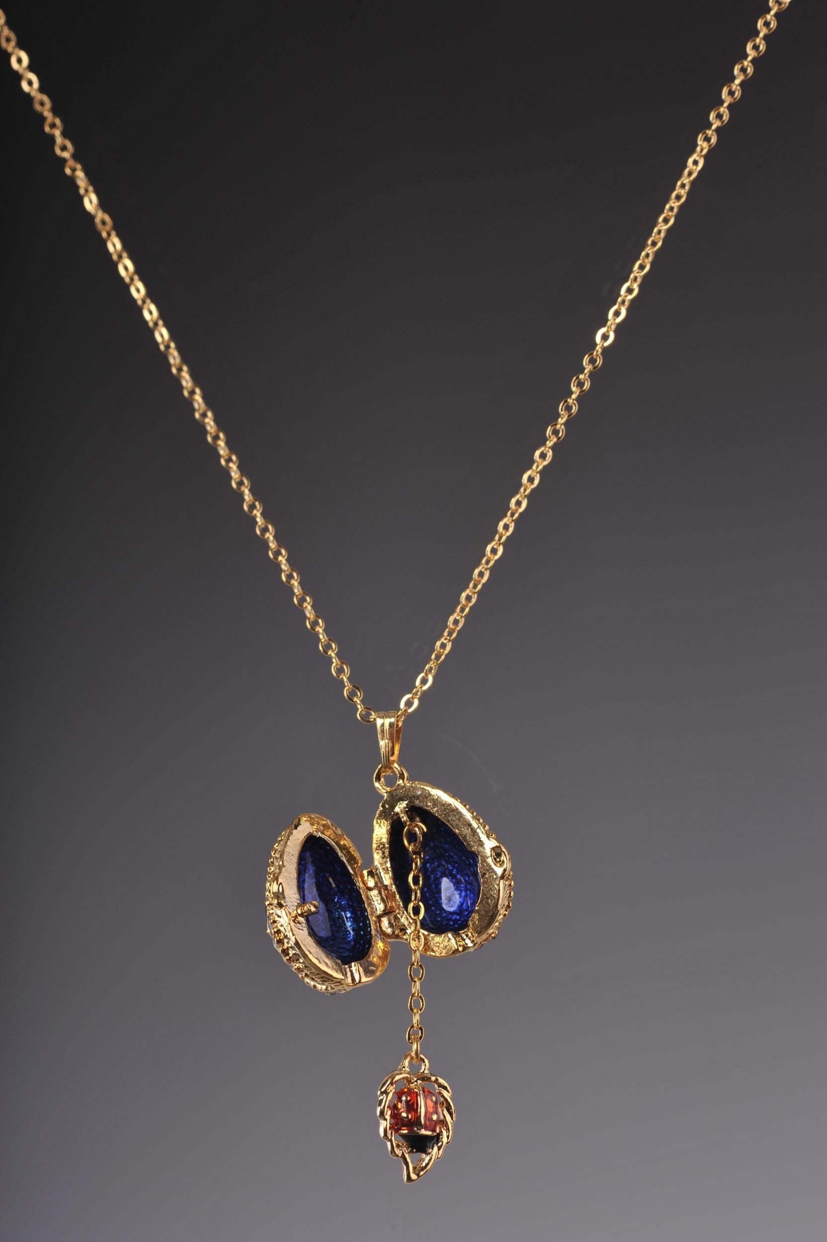 Keren Kopal Blue Egg Pendant with a Beetle