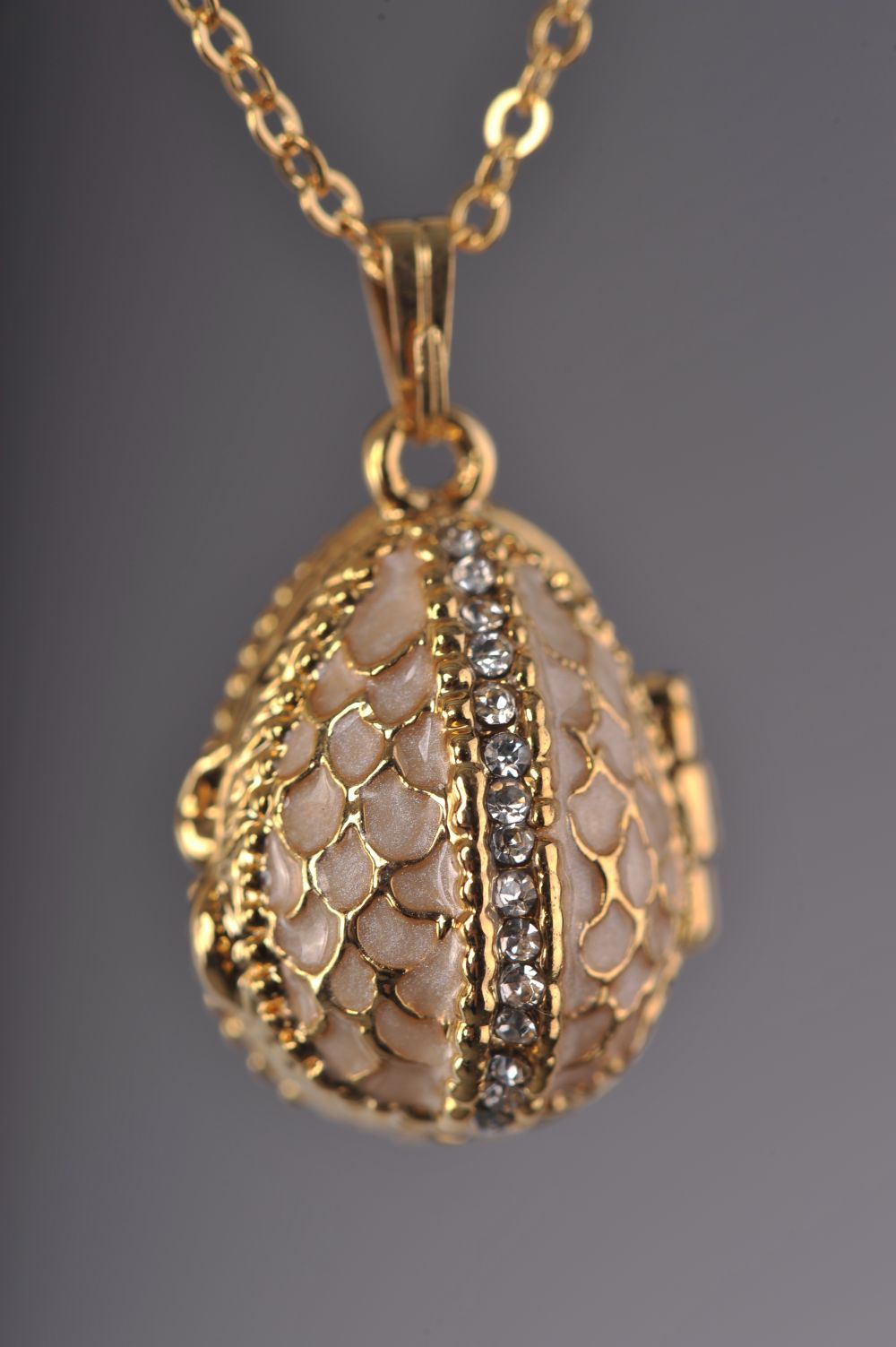Keren Kopal Moccasin Egg Pendant with a Beetle