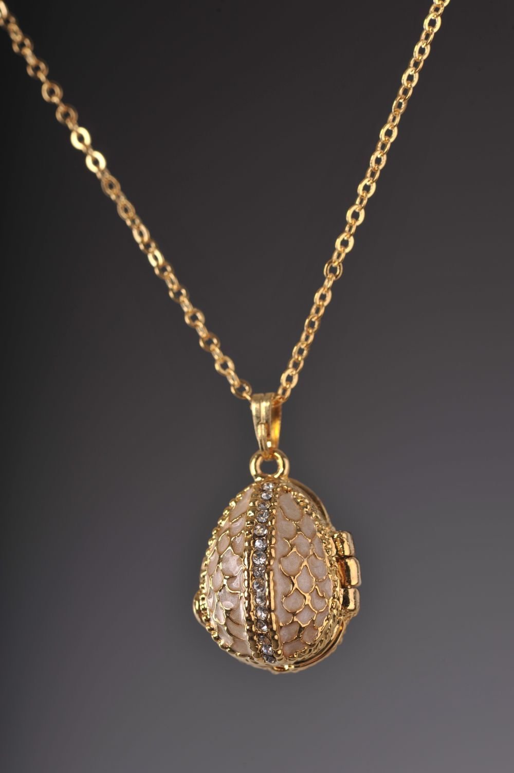 Keren Kopal Moccasin Egg Pendant with a Beetle