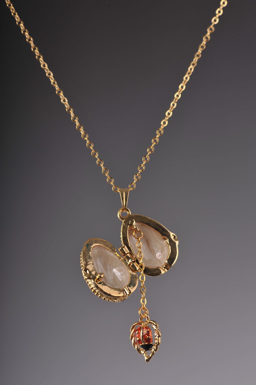 Keren Kopal Moccasin Egg Pendant with a Beetle