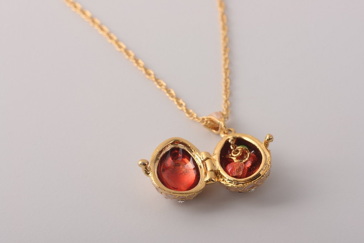 Keren Kopal Pink Pendant Necklace with an Apple Inside