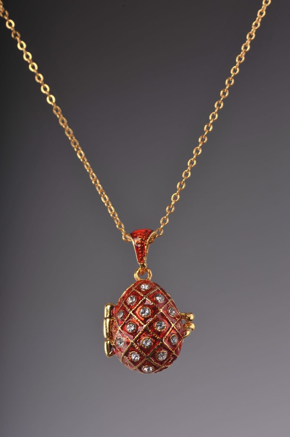 Keren Kopal Red Egg Pendant with a Surprise Apple Inside