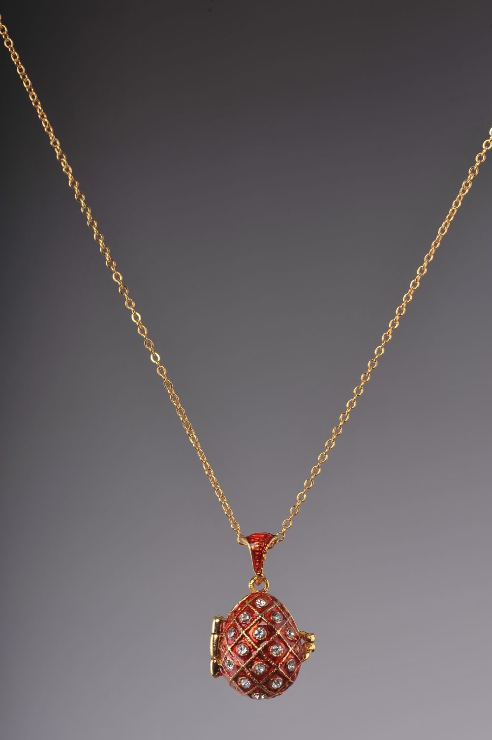 Keren Kopal Red Egg Pendant with a Surprise Apple Inside