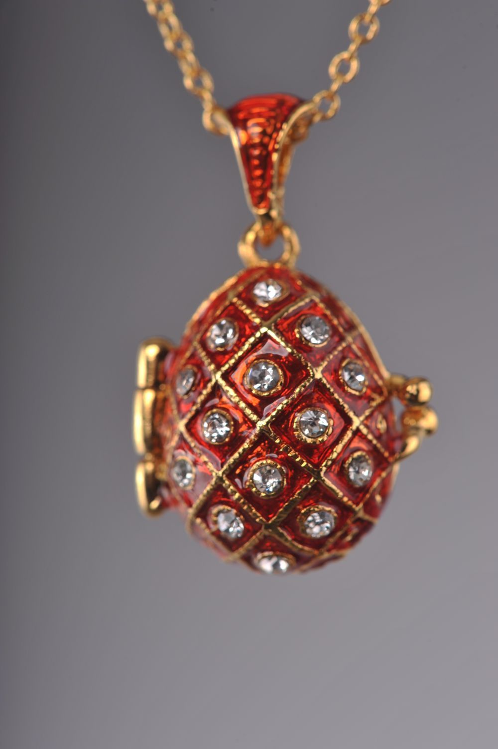 Keren Kopal Red Egg Pendant with a Surprise Apple Inside