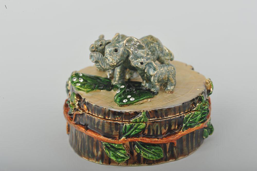 Keren Kopal Three Elephants on Tree Trunk