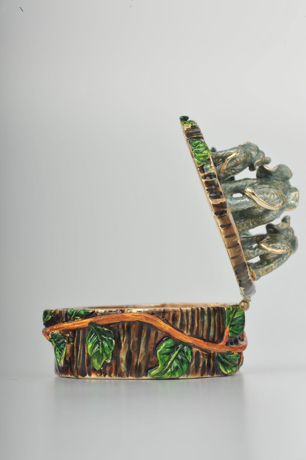 Keren Kopal Three Elephants on Tree Trunk