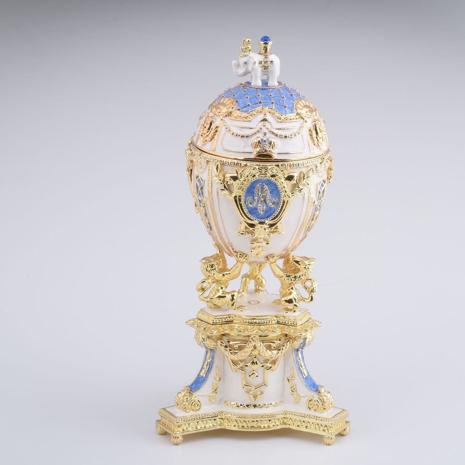 Keren Kopal White Faberge Egg with an Elephant on Top