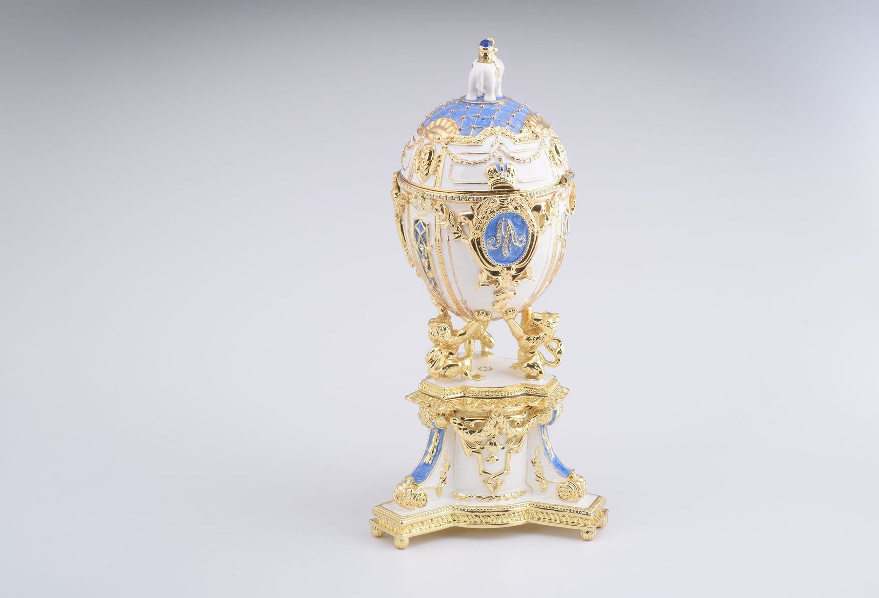 Keren Kopal White Faberge Egg with an Elephant on Top