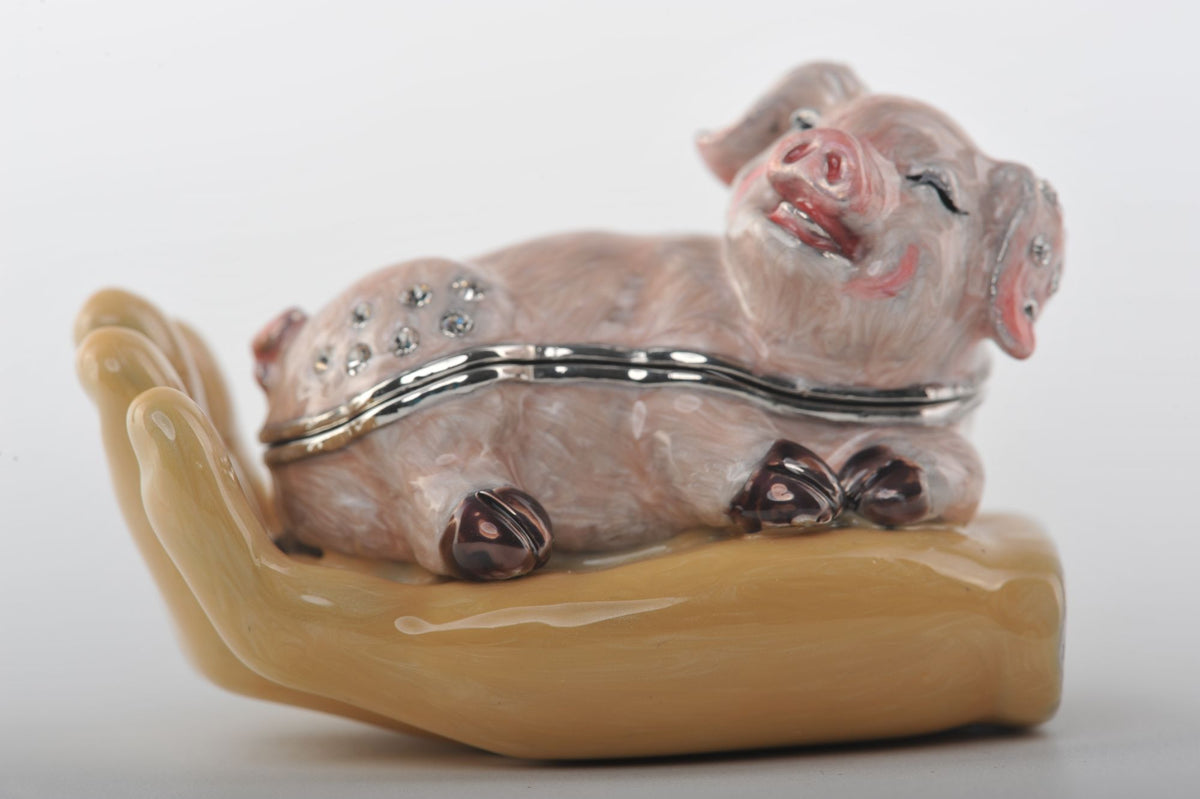 Keren Kopal Zodiac Pig Laying on Hand