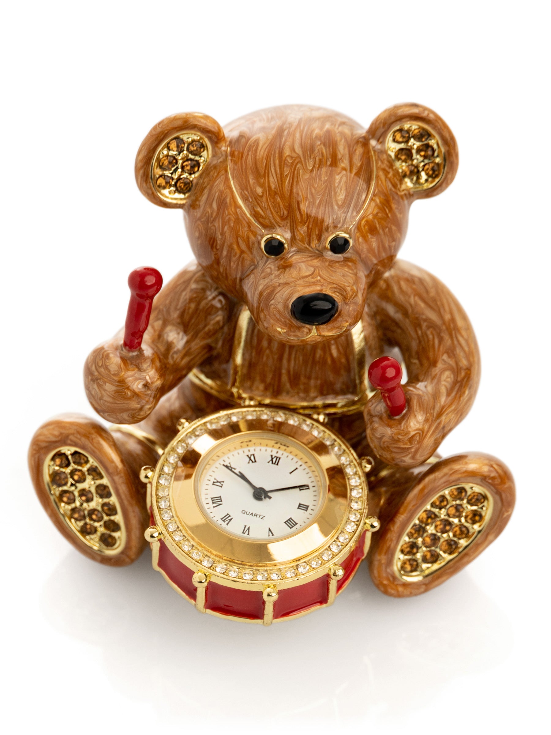 Ours brun avec horloge dans un tambour