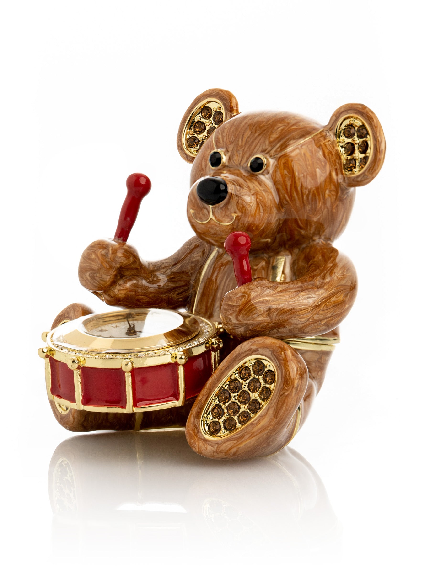 Ours brun avec horloge dans un tambour