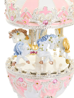 Oeuf Fabergé rose avec carrousel à chevaux à remonter