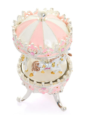 Oeuf Fabergé rose avec carrousel à chevaux à remonter