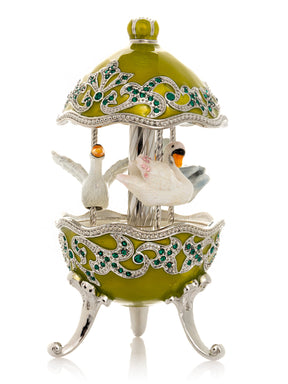 Green Wind Up Carousel with White Swans