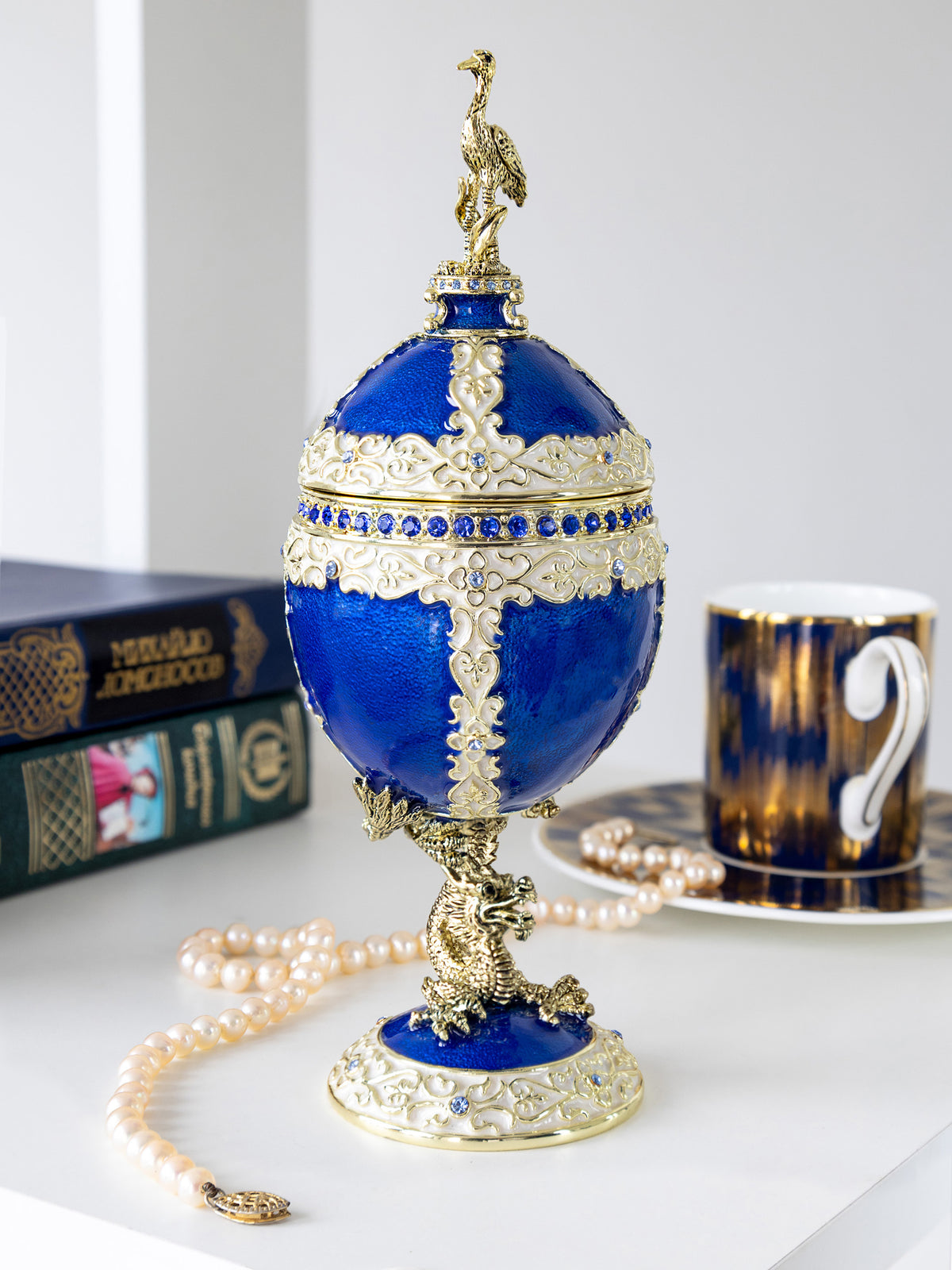 Luxurious Blue-Gold Egg with Clock with Dragon Pedestal and Bird Ornament