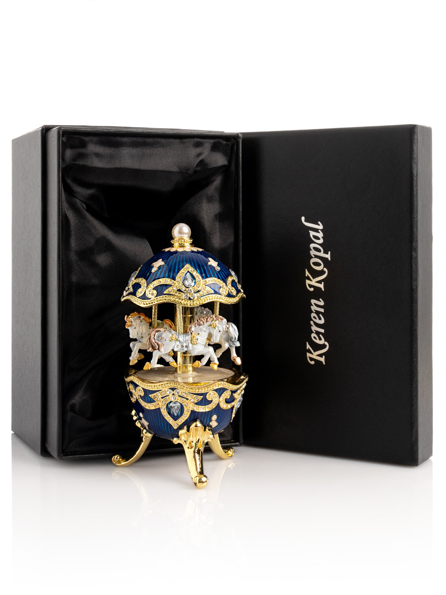 Blaues Faberge-Ei mit Pferdekarussell zum Aufziehen