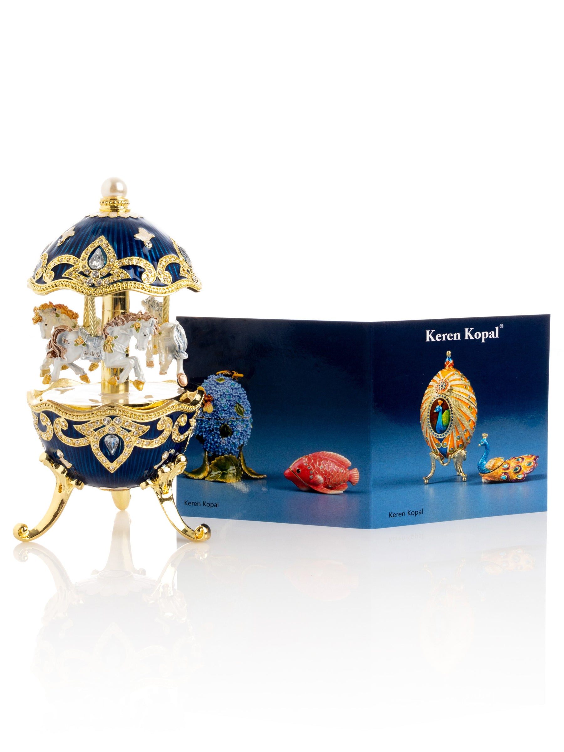 Blaues Faberge-Ei mit Pferdekarussell zum Aufziehen