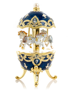 Blaues Faberge-Ei mit Pferdekarussell zum Aufziehen