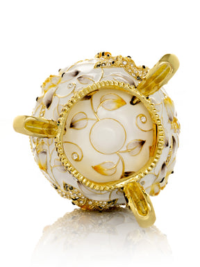 White Faberge Egg with Bees and Flowers