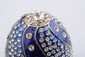 Oeuf de Fabergé bleu avec cristaux