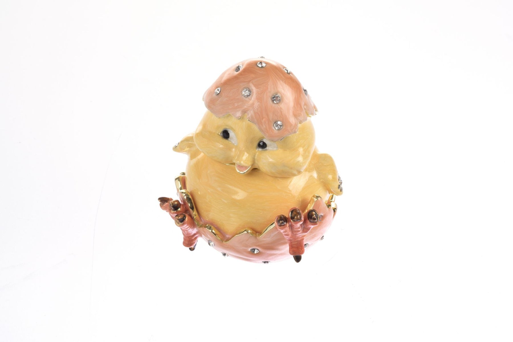 Un poussin sort d'un œuf. Boîte à bijoux
