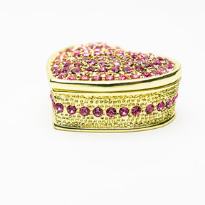 Goldenes, rosa Herz als dekorative Box
