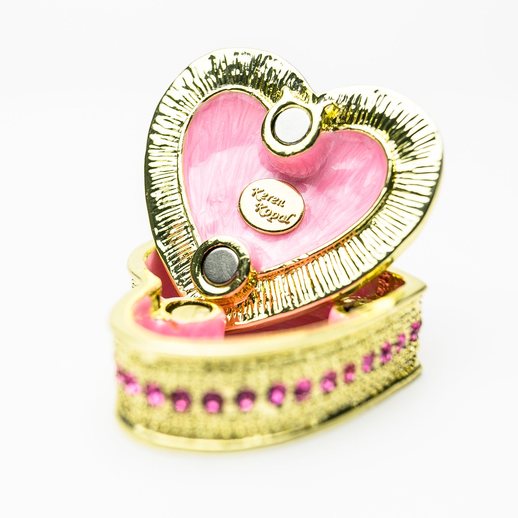 Goldenes, rosa Herz als dekorative Box