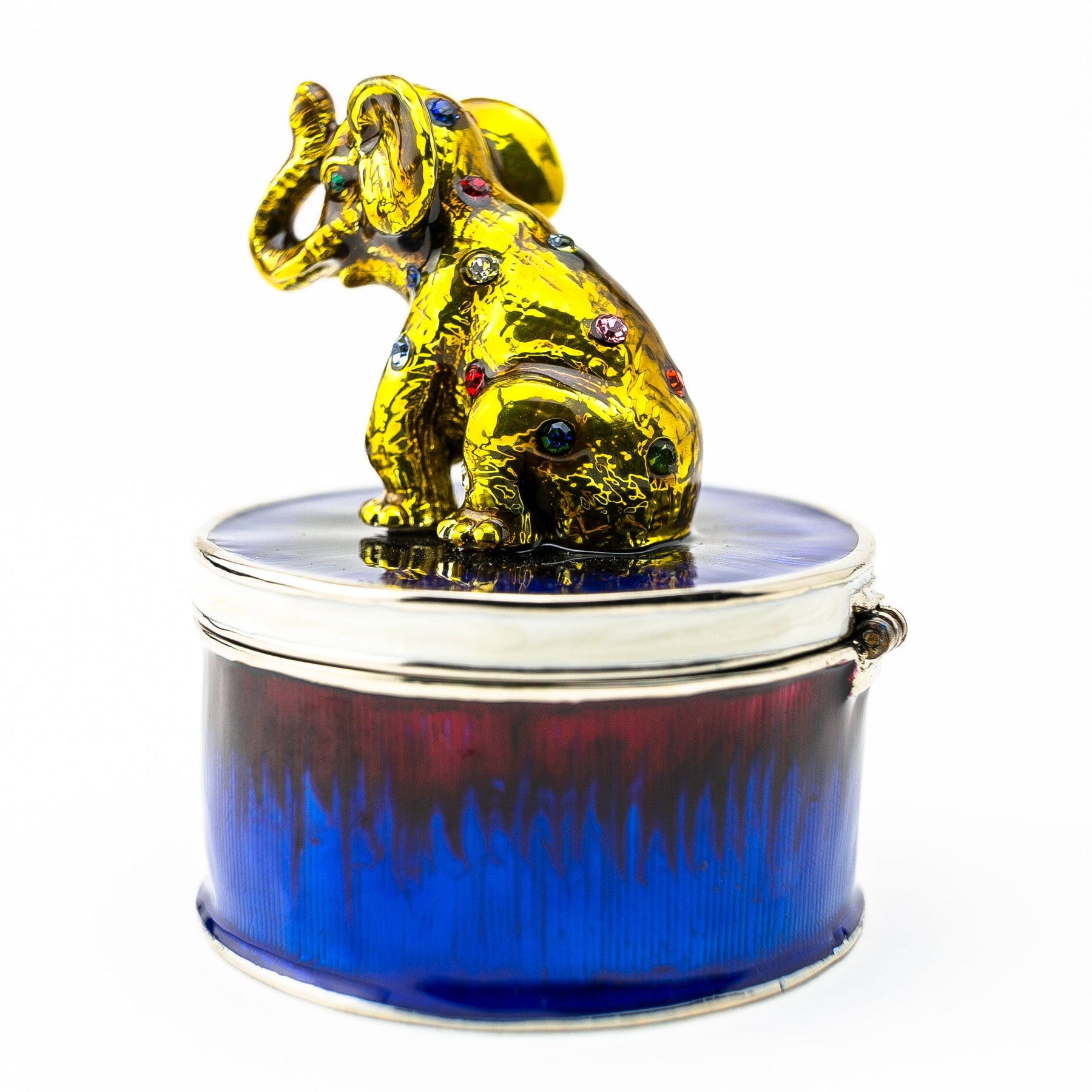 Goldener Elefant auf blauem Schmuckkästchen