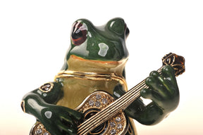 Gitarre spielender Frosch
