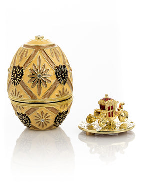 Schwarzes Fabergé-Ei mit silberner Froschüberraschung im Inneren